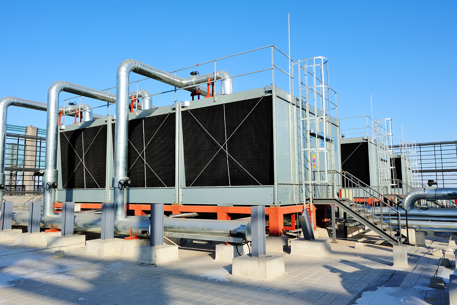 Cooling tower and industrial heat exchange infrastructure
