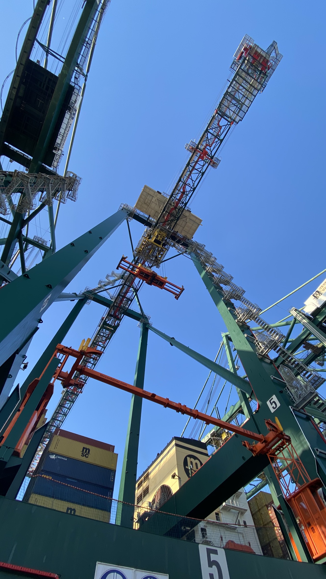 Crane structure viewed from below in an industrial asset integrity context